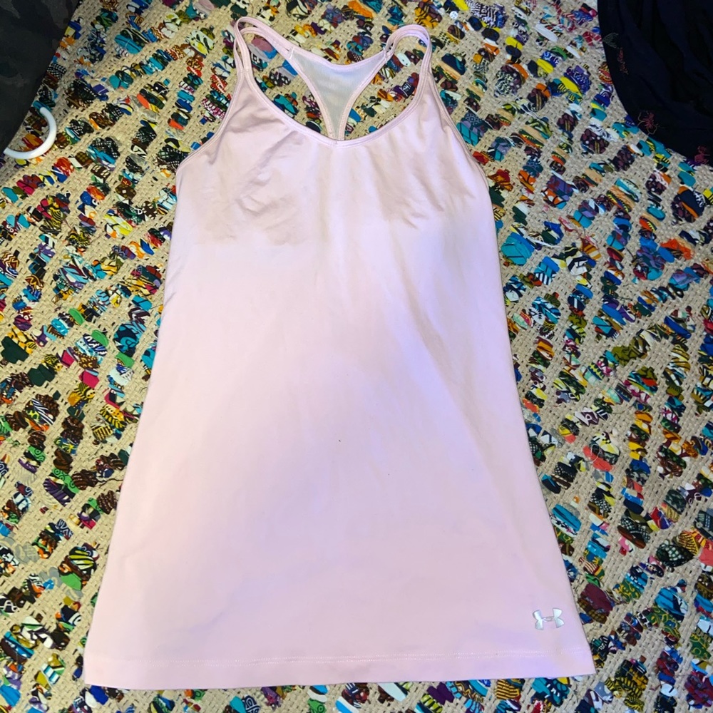 PinkUnder Armour tank top.